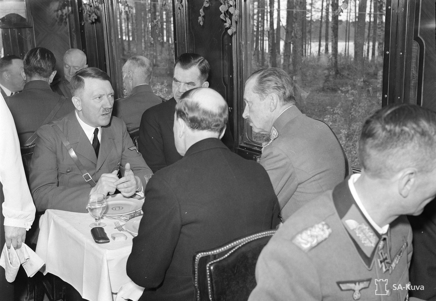 Adolf Hitler dining in the train with Finnish Prime Minister Jukka Rangell, President Risto Ryti and Marshal Carl Gustav Mannerheim